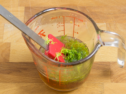 Mixer bowl of light coloured batter and a paddle attachment