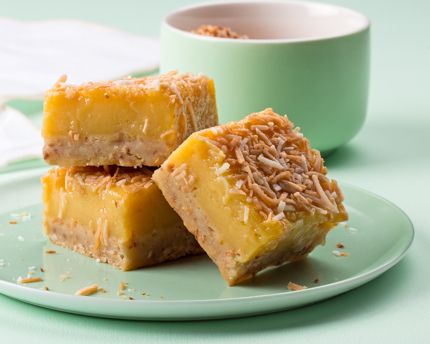 Three tropical bars with coconut crust and mango filling