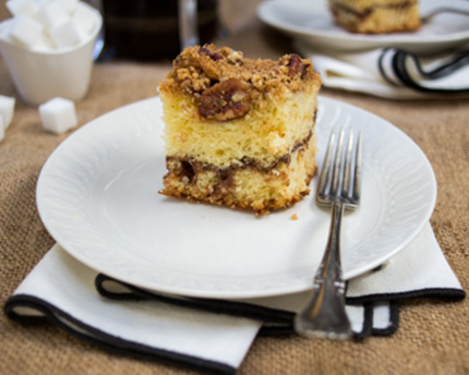 Chocolate Cinnamon Swirl Sour Cream Coffee Cake on a white plate