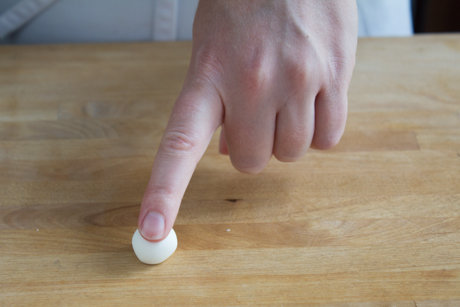 3. Using one finger press gently on the ball to flatten the top for the lid of the teapot. Set aside. 