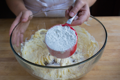 2. Start adding icing sugar, 1 cup at a time.