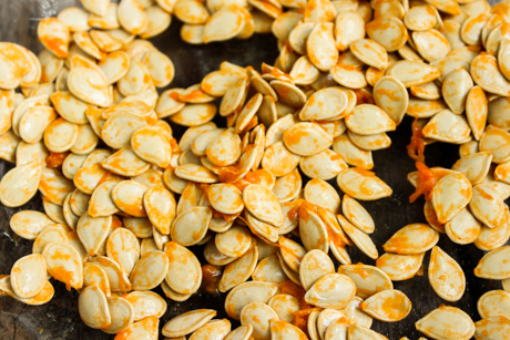  2. Collect pumpkin seeds from inside a pumpkin. Pat dry with a paper towel. Don’t fret if there is a little but of pumpkin goo on the seeds it will add additional flavour. 