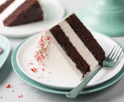 Slice of cake on a plate with a fork